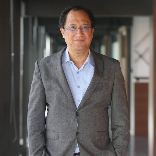 Dr. Thanachart Numnonda